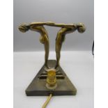Art deco brass lamp with naked figures