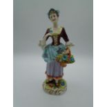 Volkstedt porcelain figure of a flower seller, mark to base, approx 20cm tall
