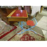 A retro folding kids desk and chair