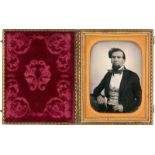 Daguerreotypes: Portrait of a distinguished man holding a letter