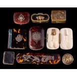 A 19th century blonde tortoiseshell spectacle case: with inlaid silver decoration,