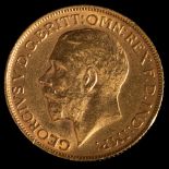 A George V gold sovereign,: 1912, 8g.