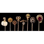 A group of antique stick pins,