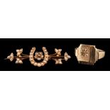 A 9 carat gold diamond signet ring,: the rectangular panel set with an eight cut diamond,