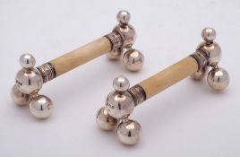 A pair of Victorian ivory and silver mounted knife rests, maker James Deakin & Sons, Sheffield,