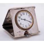 A George V silver cased travelling timepiece, maker Cohen & Charles, London,