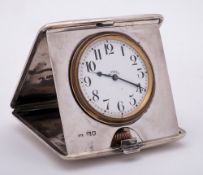 A George V silver cased travelling timepiece, maker Cohen & Charles, London,