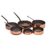 Six assorted copper graduated non matching saucepans: with steel handles, various sizes,