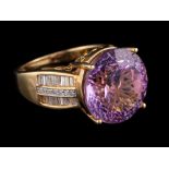 A 9 carat gold amethyst and diamond ring:,