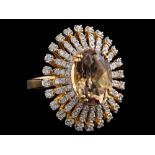 An 18 carat gold csarite and diamond ring:,