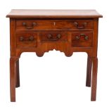 A George III mahogany rectangular lowboy:, the top with a moulded edge,