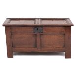 An early 18th Century oak rectangular coffer:, of small size and panelled construction,