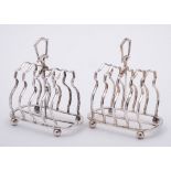 A pair of George V silver four-division toast racks, maker Edward Barnard & Sons Ltd, Birmingham,