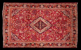 A Sarouk rug:,