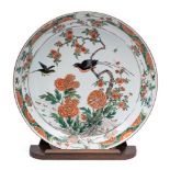 A Chinese famille verte 'birds and peony' charger: painted with two colourful long-tailed birds