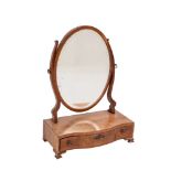 A mahogany and chequer inlaid serpentine fronted swing frame platform toilet mirror:,