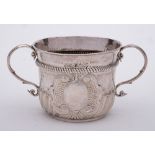 A Queen Anne Britannia silver porringer, maker Timothy Ley, London,