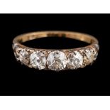 A diamond five stone ring:, set with five graduating old brilliant cut diamonds,