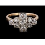 A diamond cluster ring,: the cluster set with old brilliant cut diamonds, approximately 1.