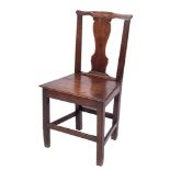 An 18th Century oak dining chair:, the back with shaped top rail and solid vase-shaped splat,