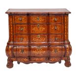 A 19th Century Dutch oak and floral marquetry serpentine block fronted chest of drawers:,