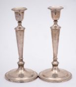 A pair of Elizabeth II silver candlesticks, maker C J Vander Ltd, London,