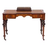 A Victorian walnut and marquetry writing table:, of recessed breakfront outline,