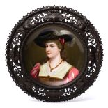 A Continental porcelain plaque in the Vienna manner: depicting a young woman wearing baroque-style