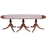 A mahogany D-end triple pillar dining table:, in the Regency taste,