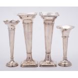 A group of four silver specimen vases, various makers and dates: all with weighted bases, 18cm,