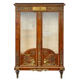 A mahogany and gilt bronze mounted and glazed vitrine in Louis XVI style,