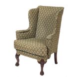 A carved mahogany wing frame armchair in the George II taste:,