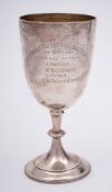 An Edward VII silver trophy cup, maker William Hutton & Sons Ltd, Sheffield, 1903: inscribed,