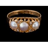 An Edwardian 18 carat gold pearl and diamond ring,