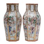 A pair of Chinese famille rose vases: of baluster hexagonal form,