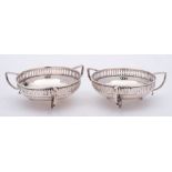 A pair of George V silver bon bon dishes.