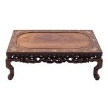 A Chinese inlaid hardwood low table: the top with recessed central panel and inlaid in mother of