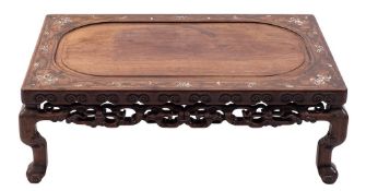 A Chinese inlaid hardwood low table: the top with recessed central panel and inlaid in mother of