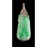 A 1920s jadeite and diamond panel,: the carved jadeite with a rose cut diamond set surmount,