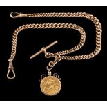 A George V gold sovereign,: 1915, in a pendant mount, on a 9 carat gold curb link chain,
