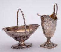 An Elizabeth II silver cream jug, maker C.J.