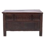 A late 17th/early 18th Century oak rectangular coffer:, with a channel moulded hinged top,