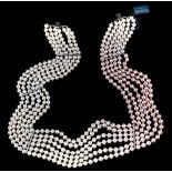 A multi strand cultured pearl and diamond necklace,