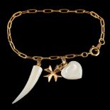 A gold coloured and mother of pearl bracelet,