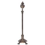 An Edwardian oxidised metal Corinthian column standard oil lamp:, adapted for electric light,