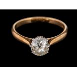 A diamond single stone ring,: the oval old cut diamond, estimated to weigh 1.