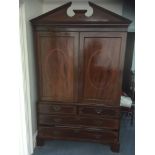 A 19th Century mahogany and inlaid linen press:,