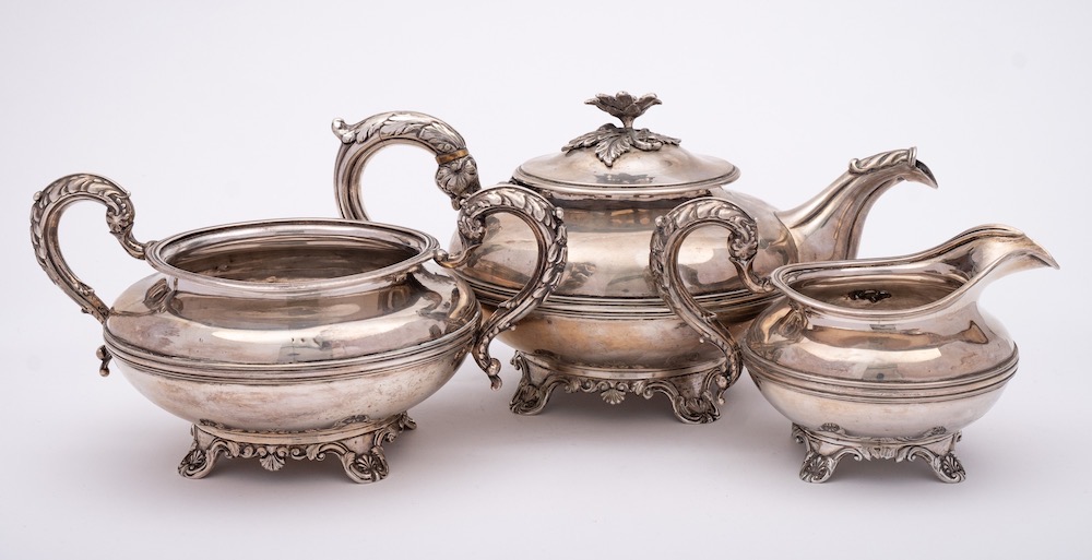 A William IV silver matched three-piece tea service: of squat globular form with reeded ribbed