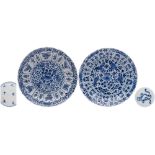 Two Chinese blue and white moulded dishes: each painted with lotus, other flowers and foliage,