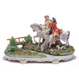 A large Sitzendorf porcelain equestrian group: depicting a courting couple on horseback before a